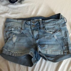 Light wash ripped jean shorts